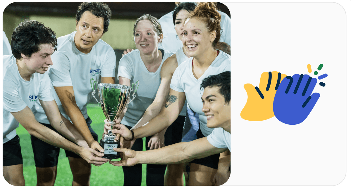 A group of athletes in white shirts celebrate, holding a trophy together, with a graphic of clapping hands to the right.