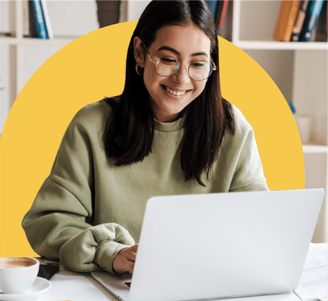 woman looking her laptop