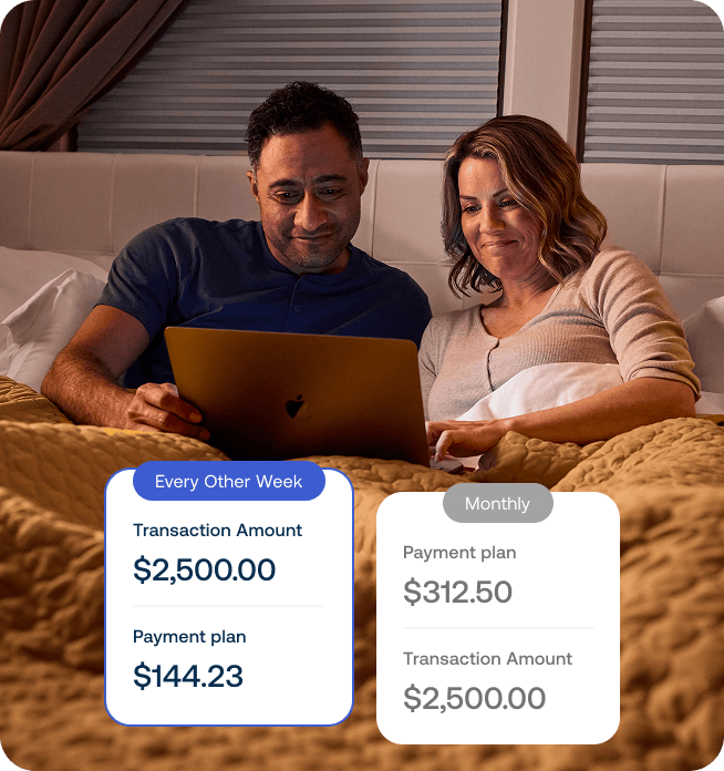 A couple browsing a laptop together. Two cards with two separate payment plans are overlaid. 