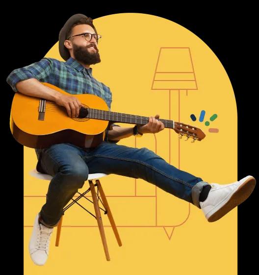 Bearded man in plaid shirt playing acoustic guitar, seated against yellow background with lamp outline