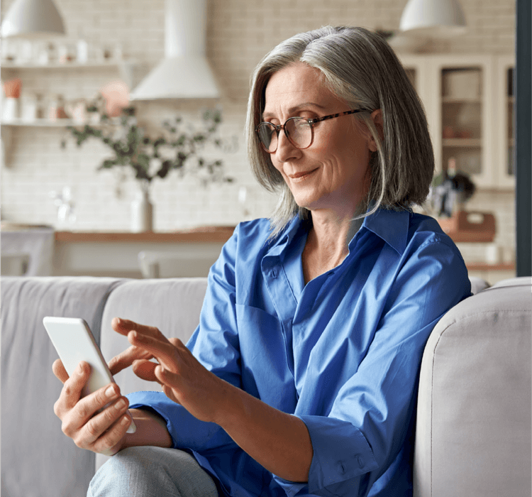 a woman looking her phone